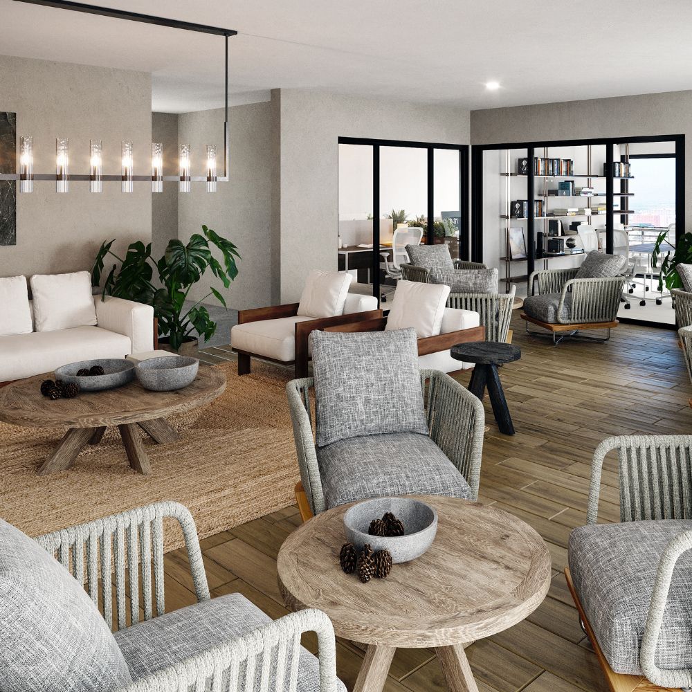 Área de coworking iluminada con mesas de trabajo